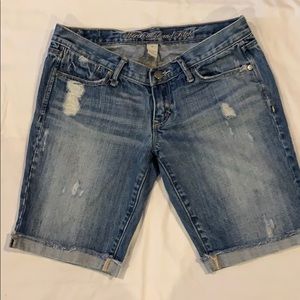 Women’s crop shorts, slightly distressed. Frayed